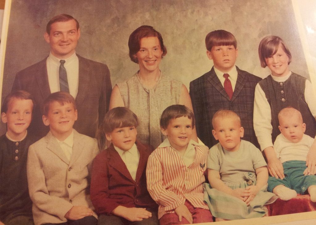 Mickley and wife with their 8 children.
